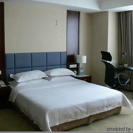New Land Business Hotel Wuhan Kamer foto