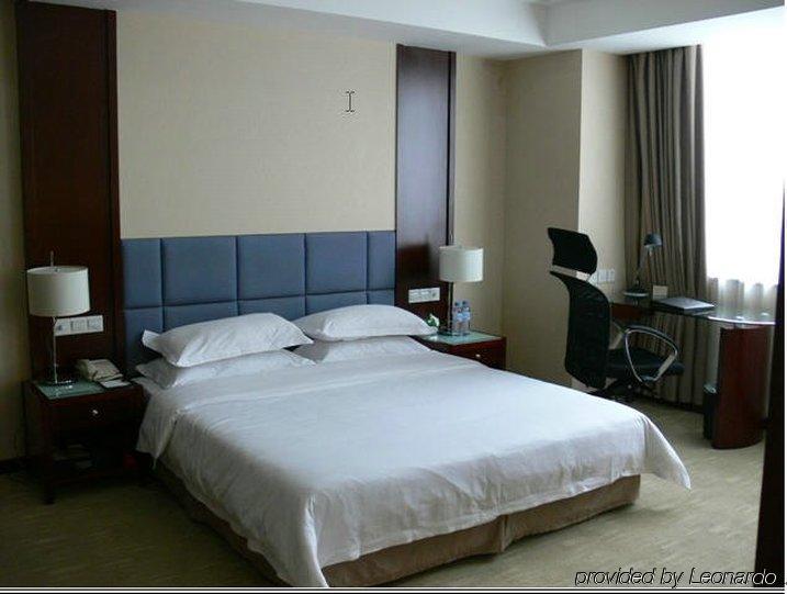 New Land Business Hotel Wuhan Kamer foto